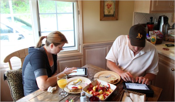 iPads at Breakfast (picture from the source article at NYTimes.com)